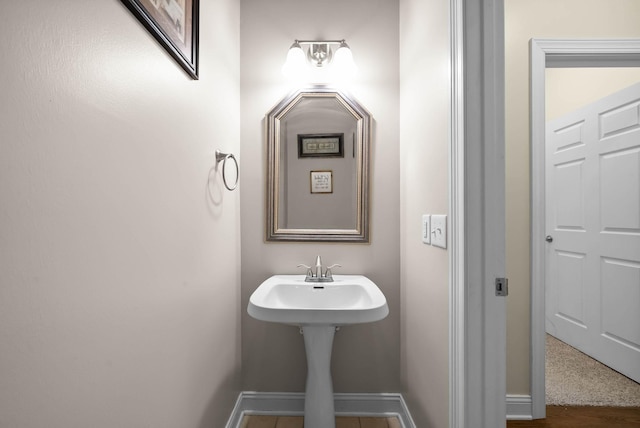 bathroom with baseboards