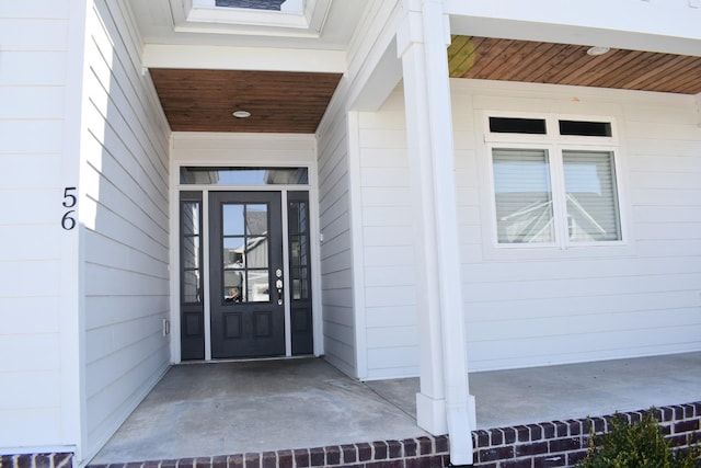 entrance to property with covered porch