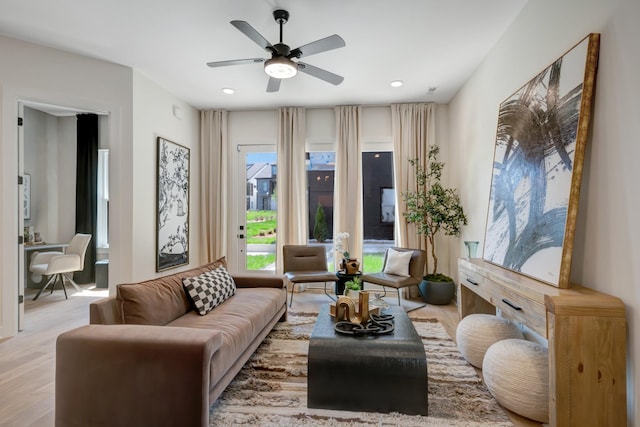 living room featuring recessed lighting and ceiling fan