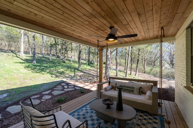 wooden terrace with ceiling fan