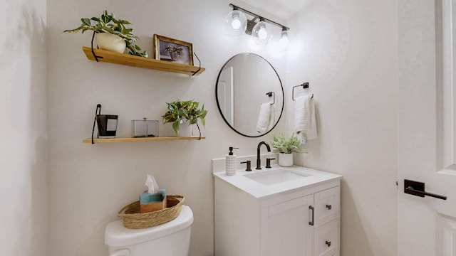 half bath with toilet and vanity