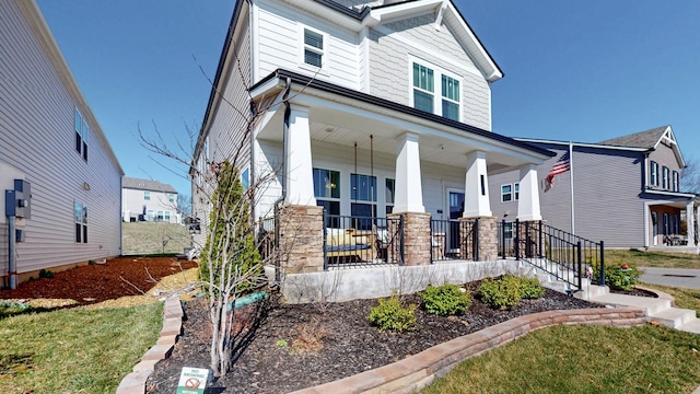 view of front of home featuring covered porch