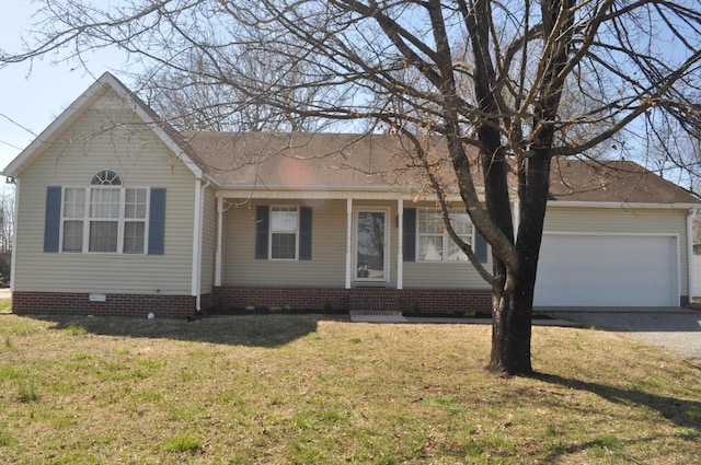 ranch-style home with a front yard, a garage, driveway, and crawl space