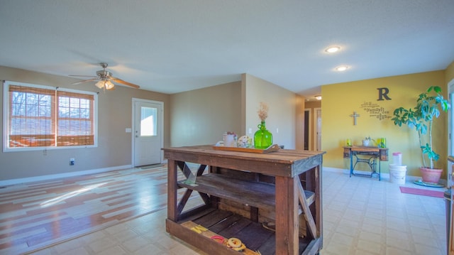 dining room with recessed lighting, light floors, a ceiling fan, and baseboards