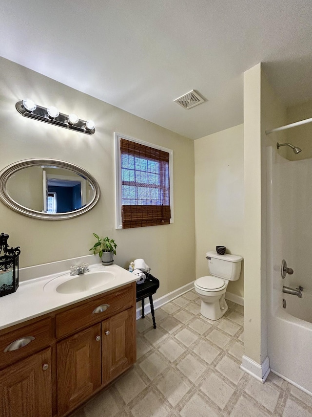 full bath with visible vents, toilet, shower / bath combination, tile patterned floors, and vanity