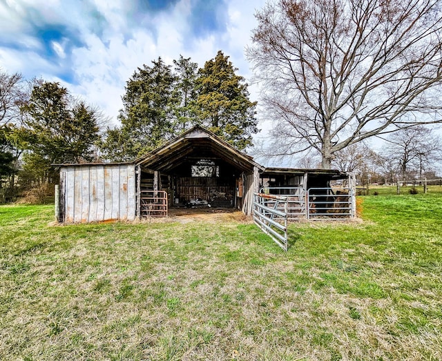 view of outbuilding featuring an outdoor structure and an exterior structure