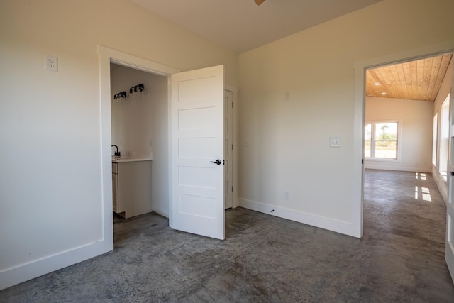 241 Springer, Hohenwald, TN 38462 - unfurnished bedroom with vaulted ceiling, baseboards, and wood ceiling