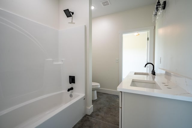 241 Springer, Hohenwald, TN 38462 - full bath with toilet, double vanity, shower / washtub combination, and concrete flooring