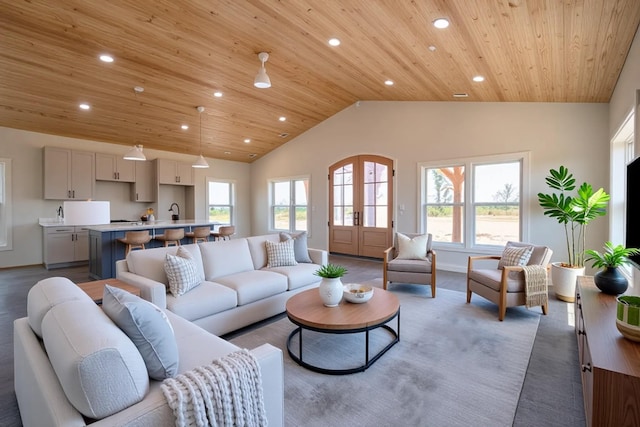 241 Springer, Hohenwald, TN 38462 - living area featuring wooden ceiling, vaulted ceiling, healthy amount of natural light, recessed lighting, and baseboards