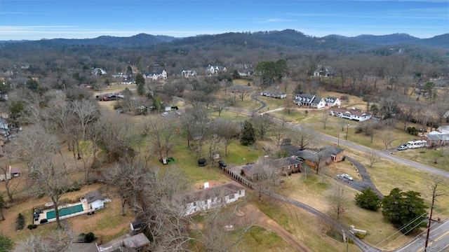 birds eye view of property with a mountain view