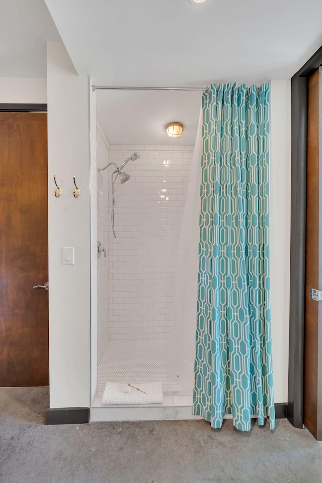 bathroom with a stall shower