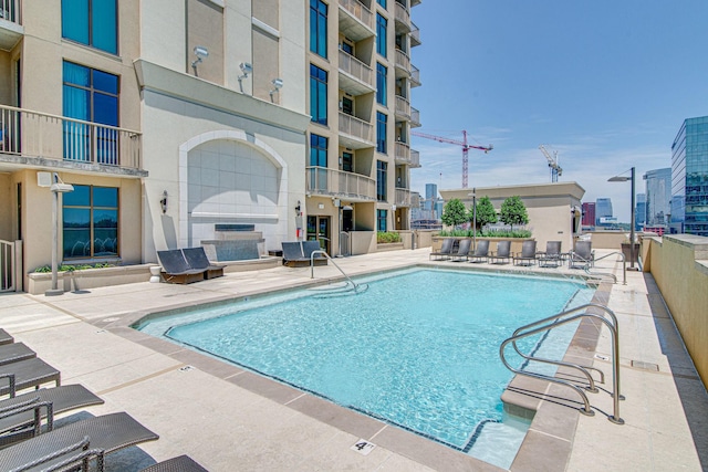 pool featuring a patio area