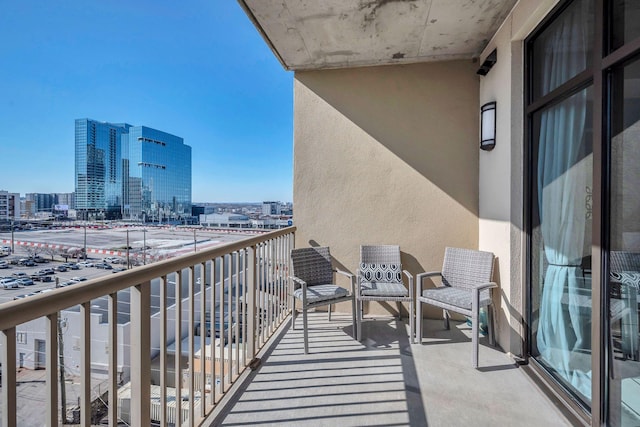 balcony featuring a city view