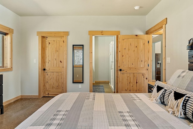 bedroom featuring baseboards