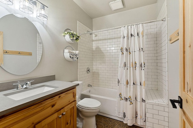 bathroom featuring toilet, vanity, and shower / bath combo