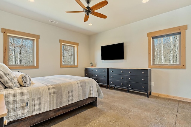 bedroom with recessed lighting, visible vents, multiple windows, and baseboards