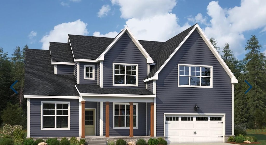 view of front facade with concrete driveway, a garage, and a shingled roof