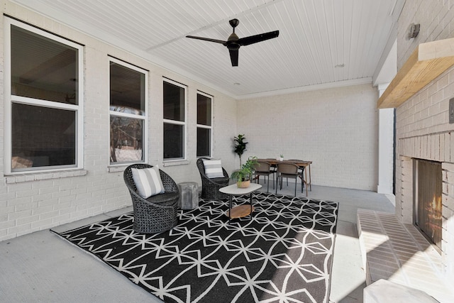 view of patio featuring ceiling fan