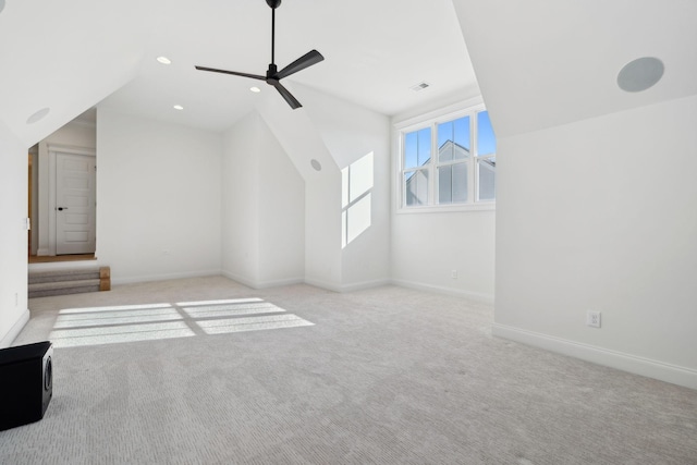 bonus room featuring baseboards, lofted ceiling, carpet flooring, recessed lighting, and a ceiling fan