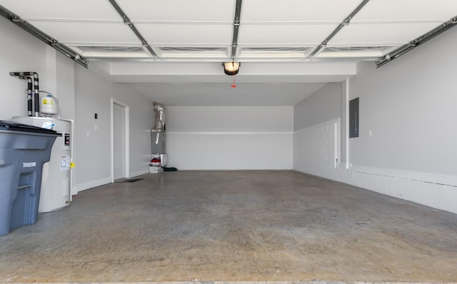 garage featuring electric panel, water heater, and a garage door opener