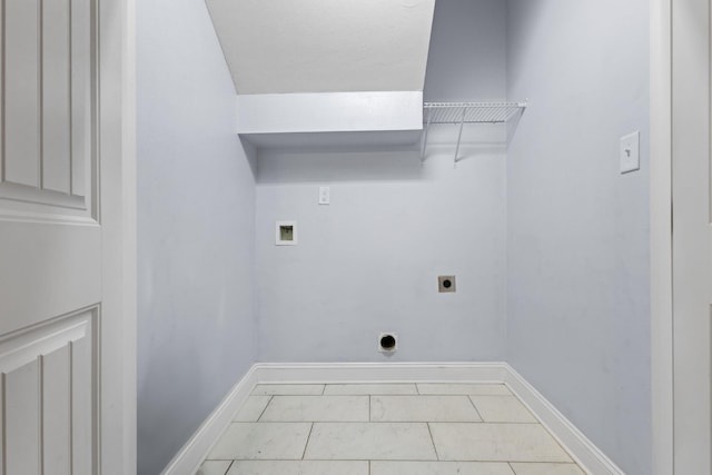 clothes washing area featuring hookup for a washing machine, baseboards, hookup for an electric dryer, and laundry area