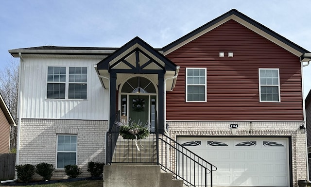 view of front of property with a garage