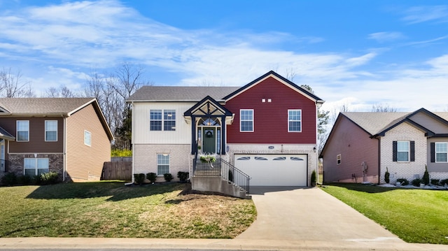 raised ranch with brick siding, driveway, an attached garage, and a front yard