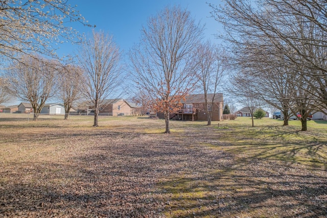 view of yard with a wooden deck