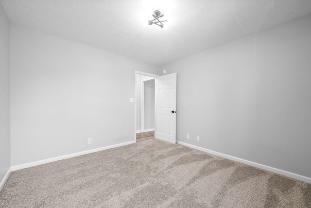 3441 Foxrun Ln, Clarksville, TN 37042 - carpeted spare room with a textured ceiling and baseboards