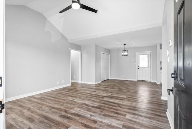 3441 Foxrun Ln, Clarksville, TN 37042 - foyer entrance with baseboards, dark wood-type flooring, lofted ceiling, and ceiling fan with notable chandelier