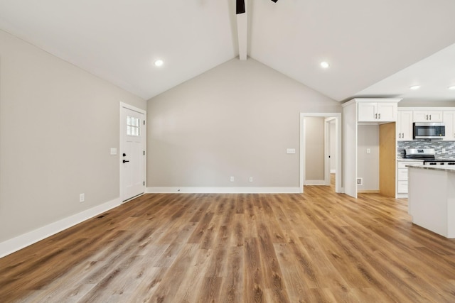 1507 New Harmony Rd, Hartsville, TN 37074 - unfurnished living room featuring light wood finished floors, baseboards, and recessed lighting