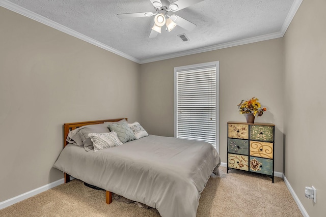 bedroom with baseboards, visible vents, and light carpet