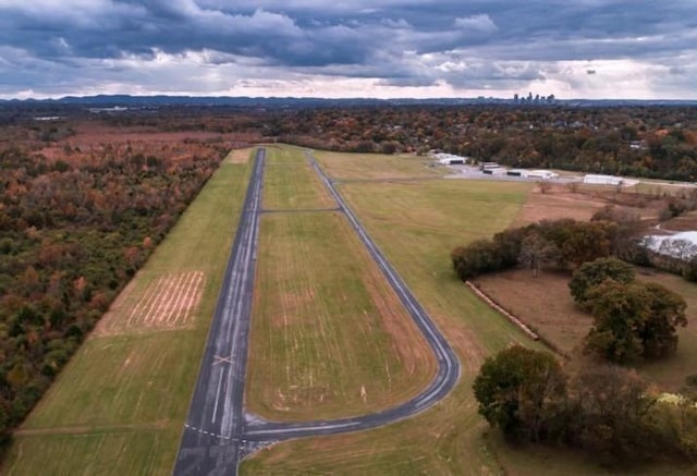 birds eye view of property featuring a rural view