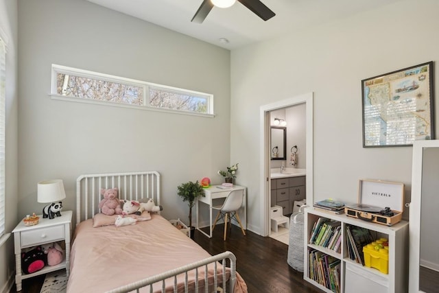 bedroom featuring a ceiling fan, dark wood-style floors, baseboards, and ensuite bathroom