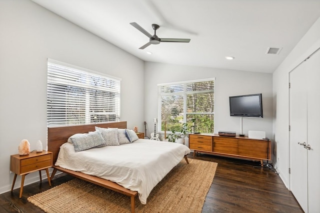 bedroom with dark wood finished floors, visible vents, recessed lighting, and lofted ceiling