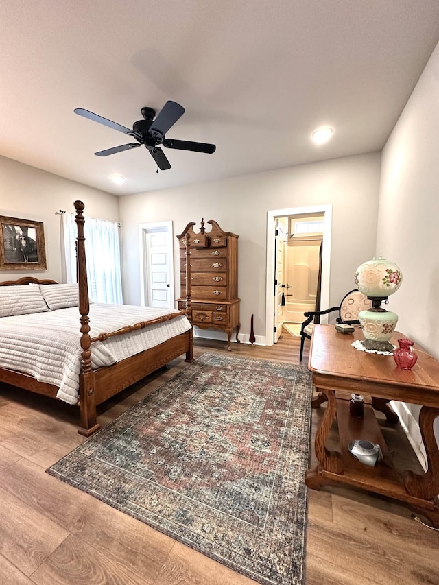 bedroom featuring recessed lighting, wood finished floors, and ceiling fan