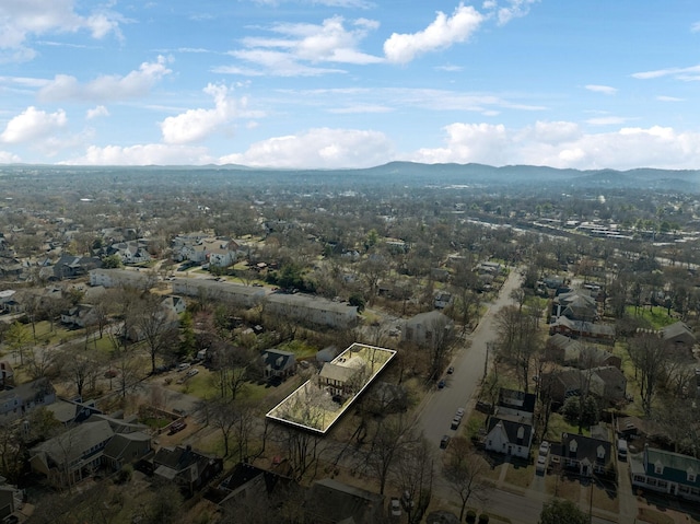 drone / aerial view featuring a mountain view