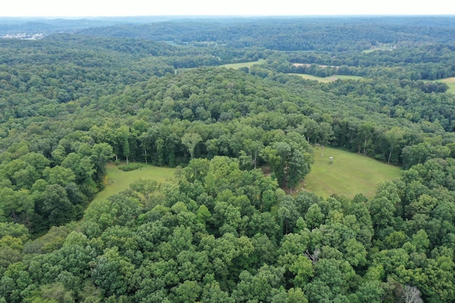 aerial view featuring a view of trees