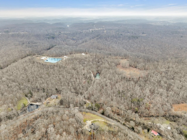 bird's eye view featuring a view of trees