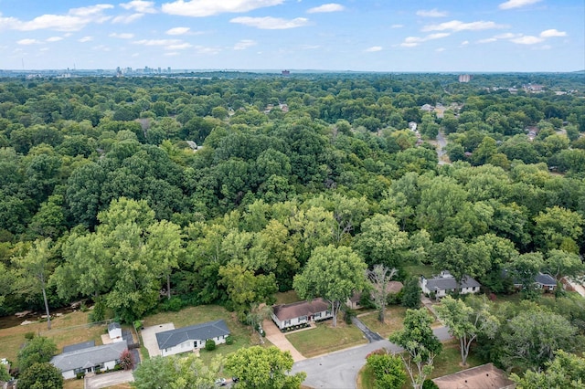 aerial view with a wooded view