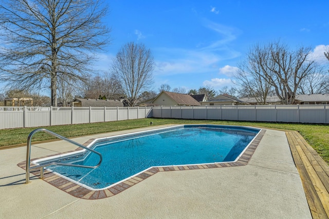 view of swimming pool with a fenced in pool, a lawn, a fenced backyard, and a patio area