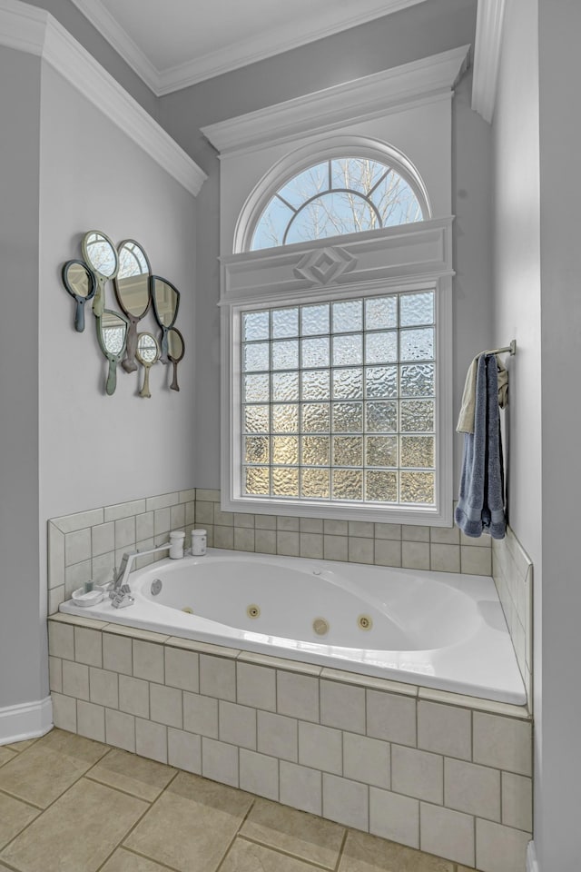 full bathroom with tile patterned floors, a tub with jets, and ornamental molding