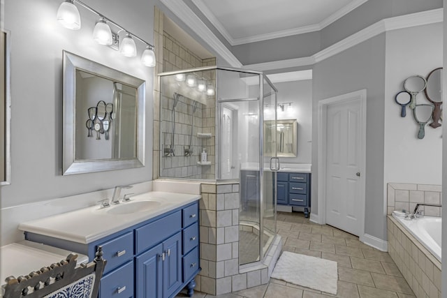 bathroom with a garden tub, vanity, ornamental molding, and a shower stall