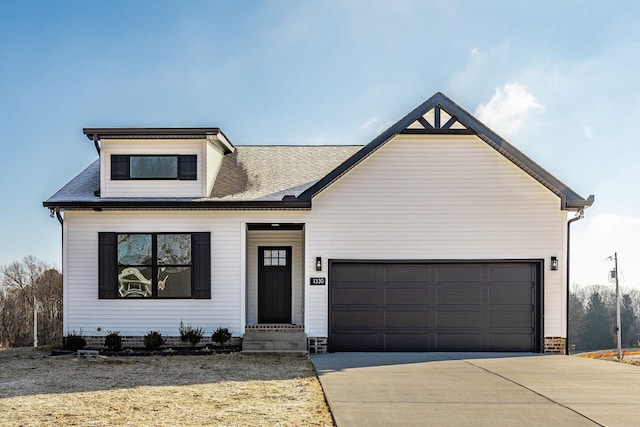 view of front facade featuring a garage and driveway