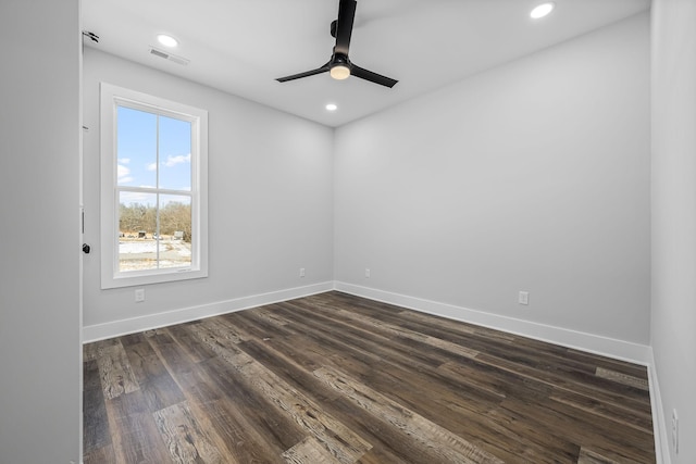 unfurnished room featuring recessed lighting, visible vents, baseboards, and dark wood-type flooring