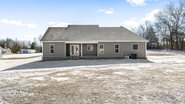 back of property with central AC unit