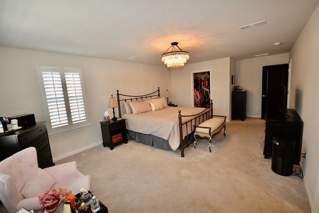 bedroom with a notable chandelier, light colored carpet, visible vents, and baseboards