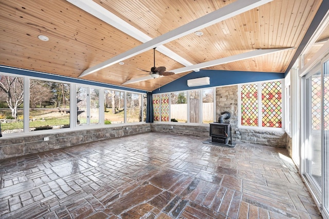 unfurnished sunroom featuring wooden ceiling, a wood stove, vaulted ceiling with beams, and a wealth of natural light