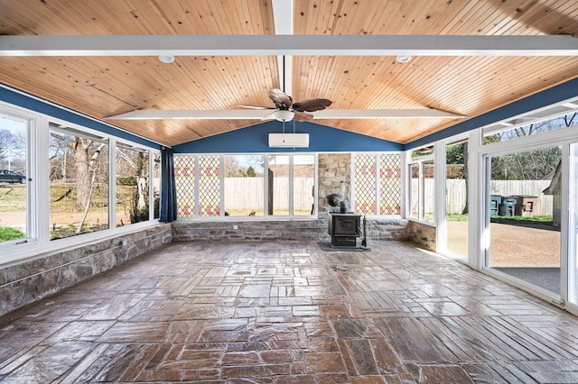 unfurnished sunroom with wooden ceiling, a wood stove, vaulted ceiling with beams, and ceiling fan