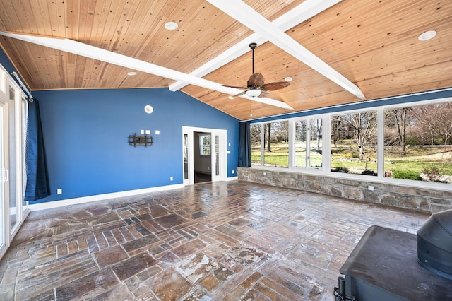 unfurnished sunroom with lofted ceiling with beams, wooden ceiling, and ceiling fan